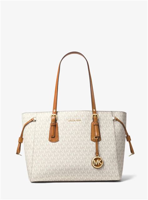 michael michael kors voyager medium logo tote bag|michael kors two tone bag.